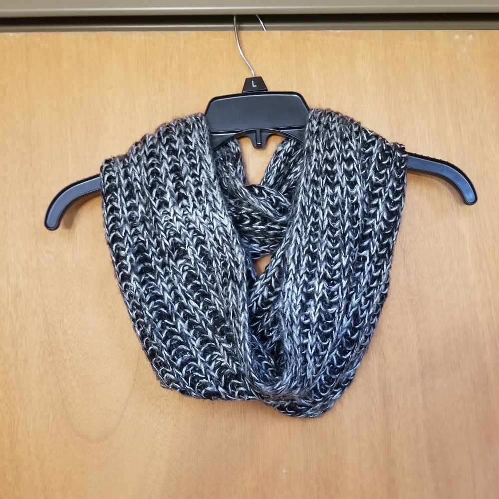 Two scarves: Blue zigzag pattern and black/white infinity scarf